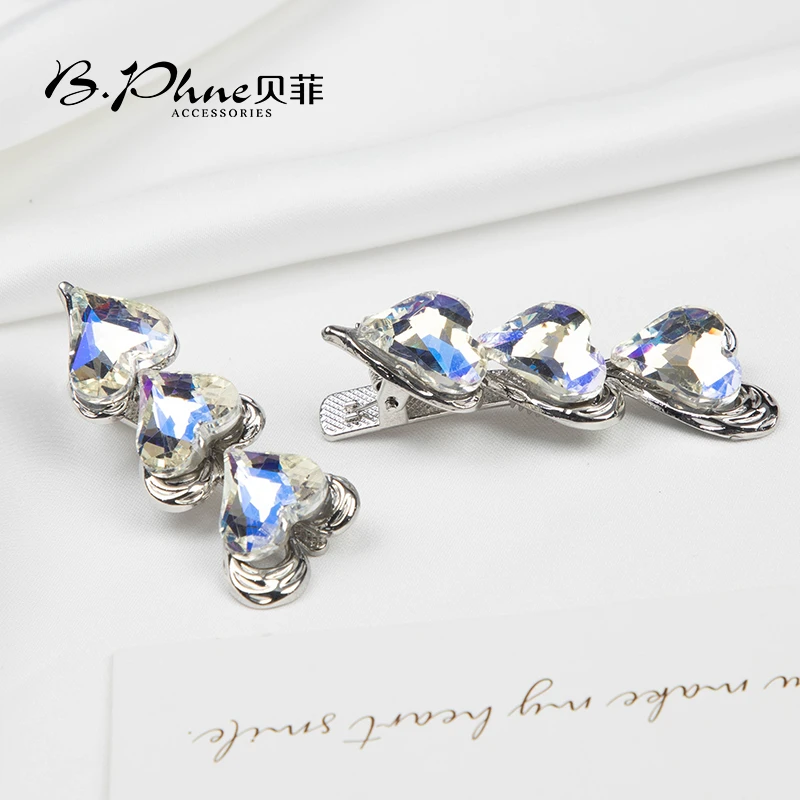 B.【贝菲】设计师活彩爱心鸭嘴夹气质