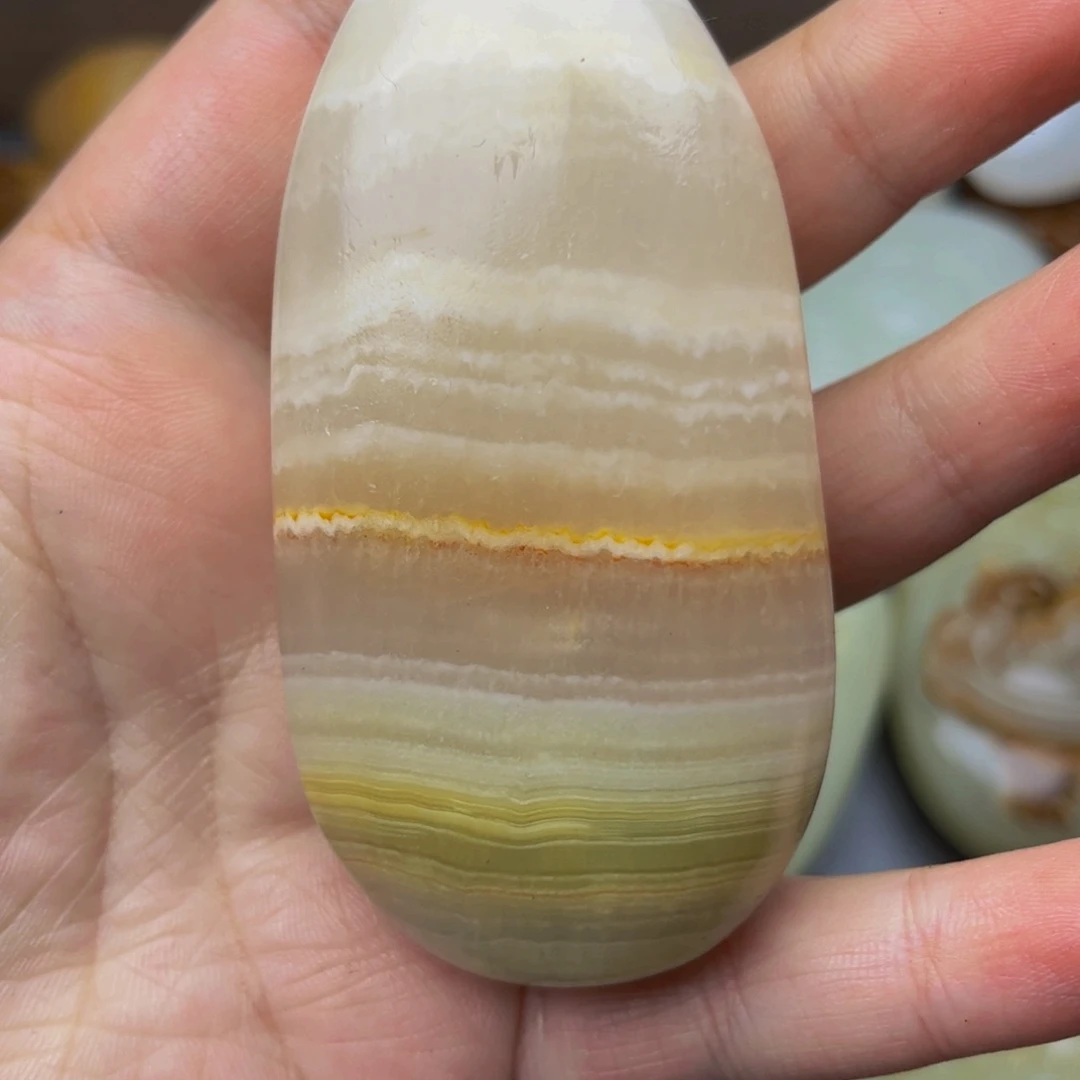 石材方解石手把件原石