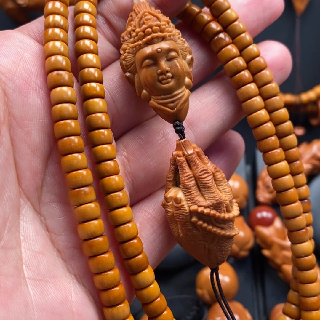 橄榄核手串观音脖挂