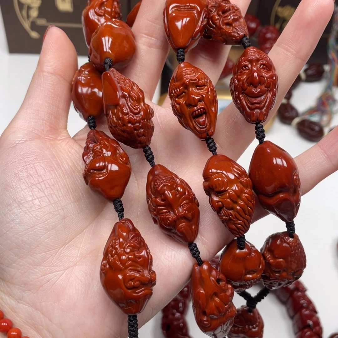 橄榄核手串纵***?十八罗汉脖挂