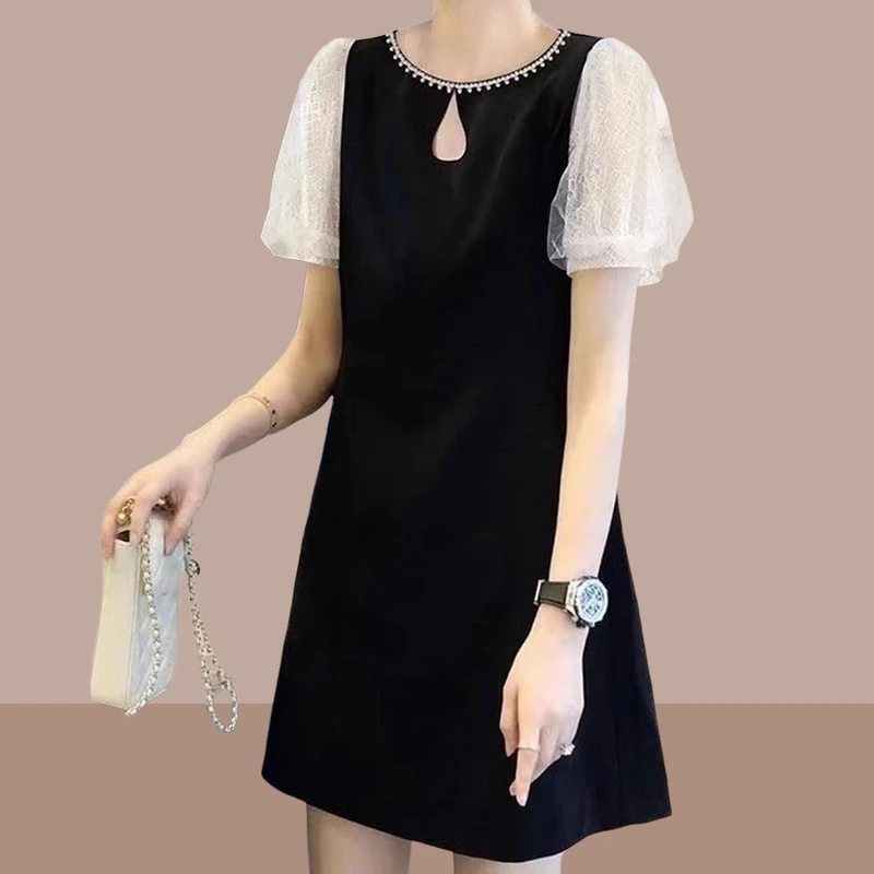 法式小众别致小黑裙女2025夏季新款轻奢气质舒适时尚中长款连衣裙