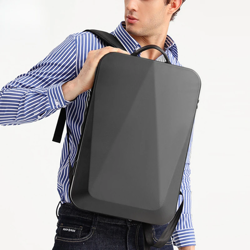 新款pc硬壳双肩包男潮酷电脑商务办公防水包运动旅行背包backpack