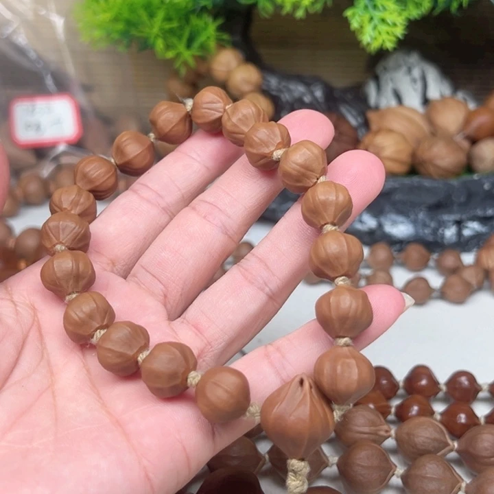 纵***)吊坠橄榄核1.25+素核