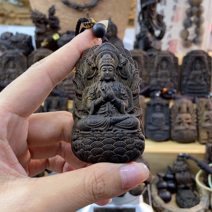 木新*往海南莺歌绿奇楠观音牌