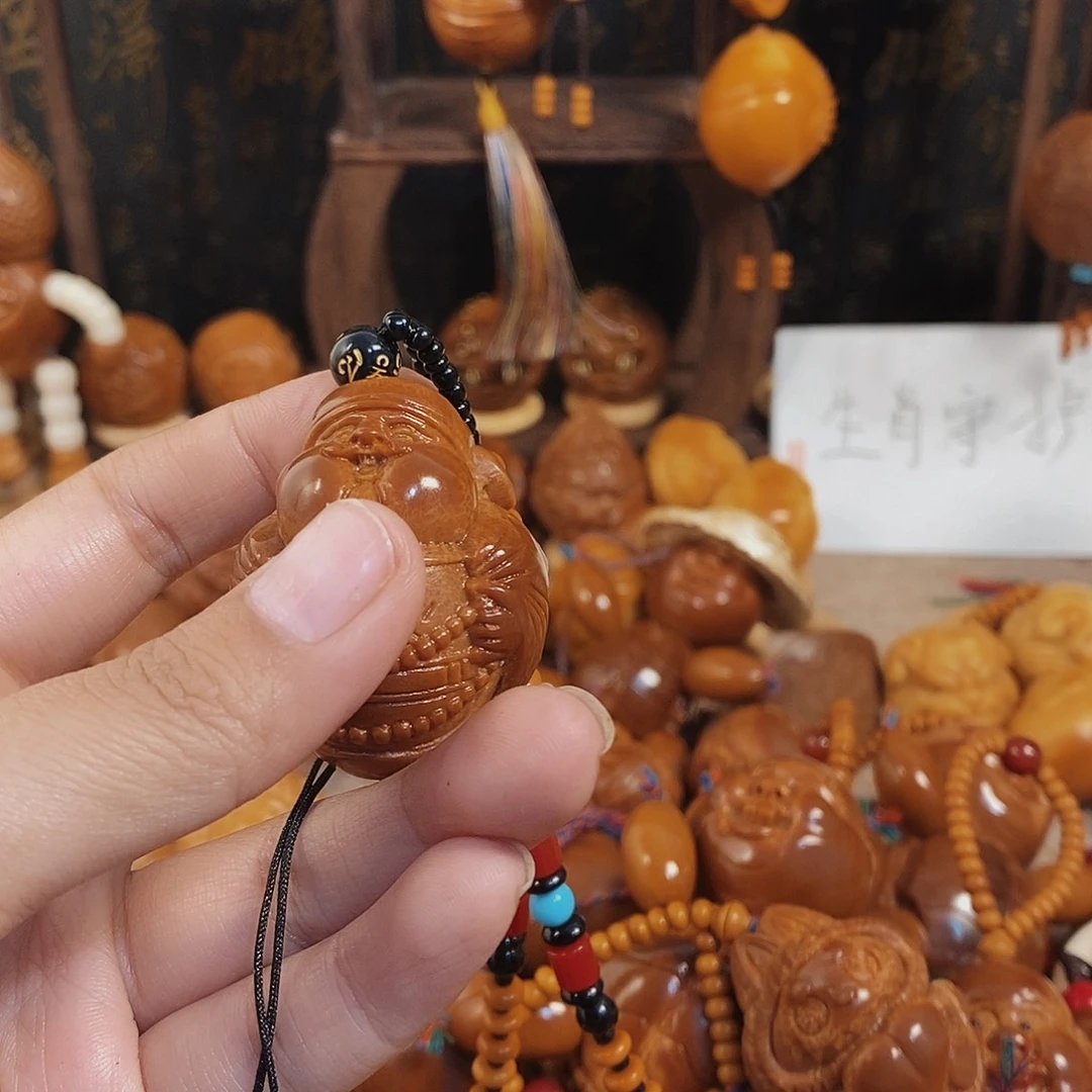 璇***﹉橄榄核手串/手链博挂嘟嘟00999