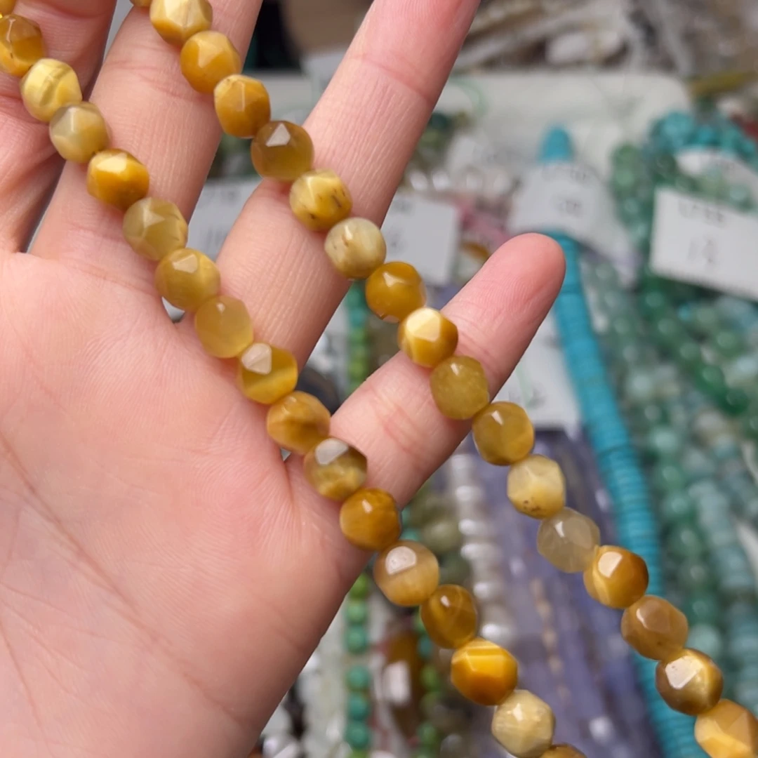 玛瑙/玉髓合金珠宝半成品L735。7.5mm天然金虎眼钻切一条