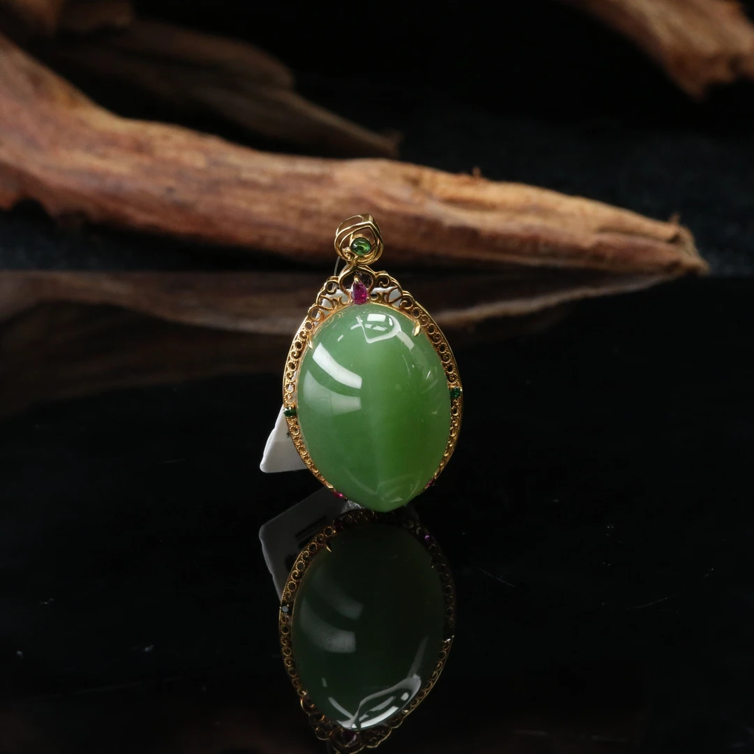 7和田玉18k碧玉猫眼吊坠/201544北京中保拍卖