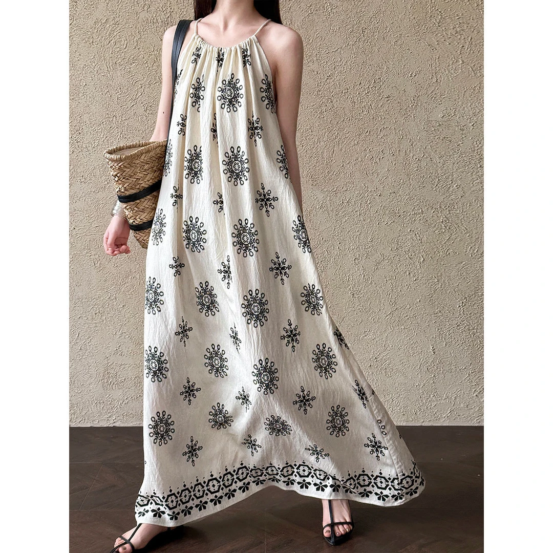 慵懒气质度假风吊带连衣裙女新款小众设计印花显瘦长裙9722