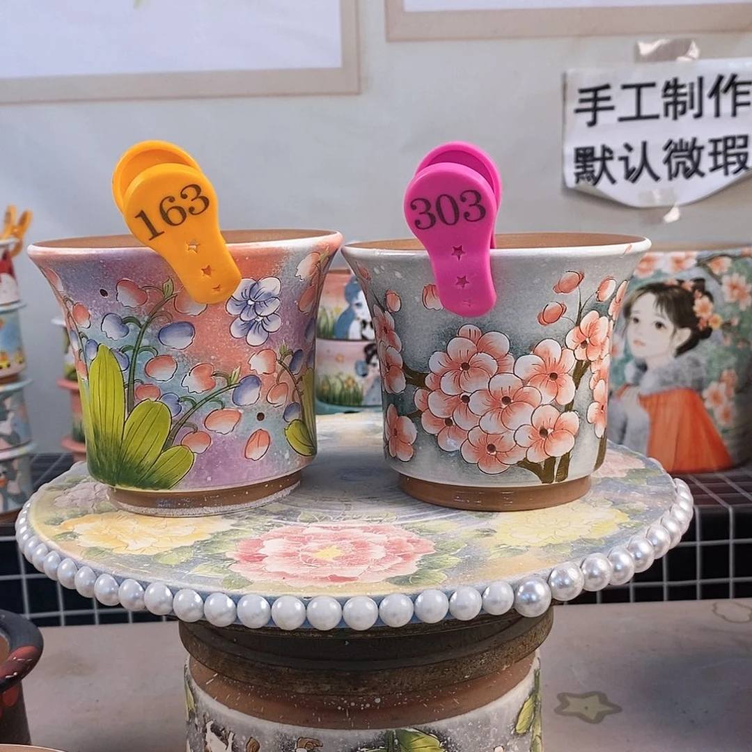 紫砂花盆知****?红陶手绘花盆