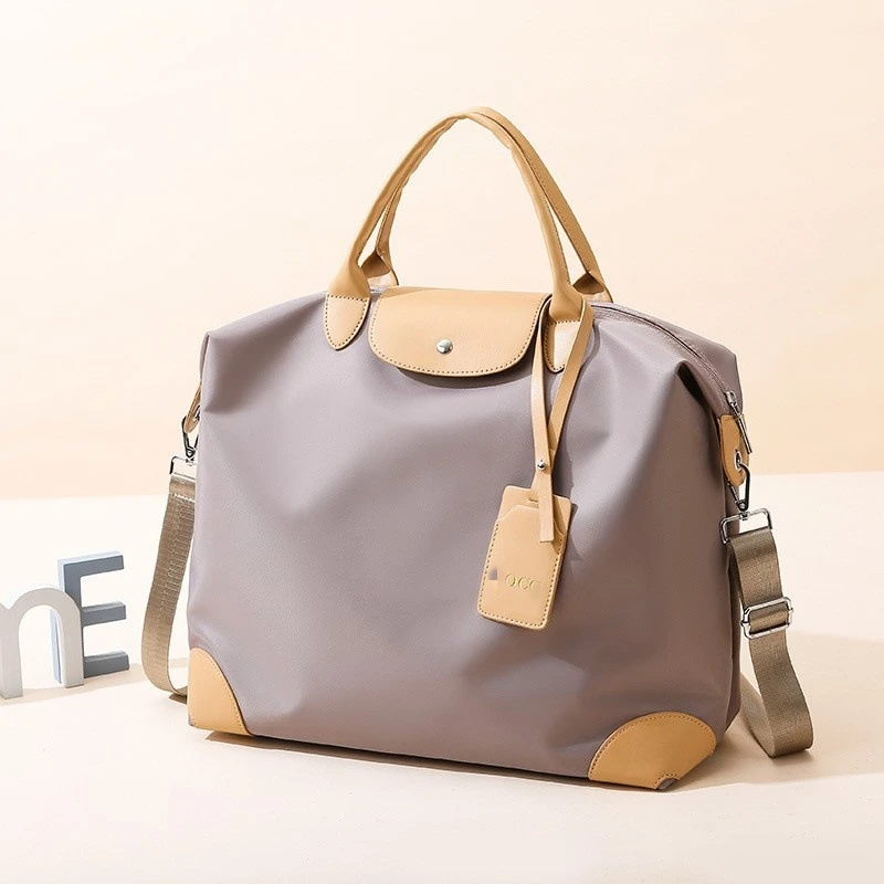 新款大容量手提旅行包轻便防水运动健身包登机包旅行袋行李袋