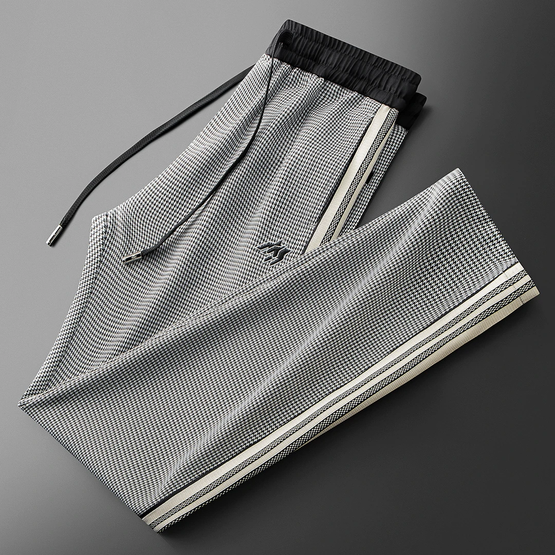 夏季时尚潮流冰丝千鸟格撞色织带拼接男士宽松微阔运动直筒休闲裤