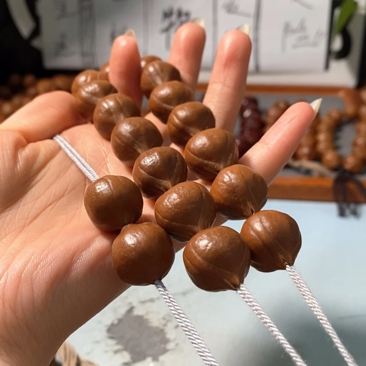 橄榄核手串9171精品蒜头铁核16+2颗