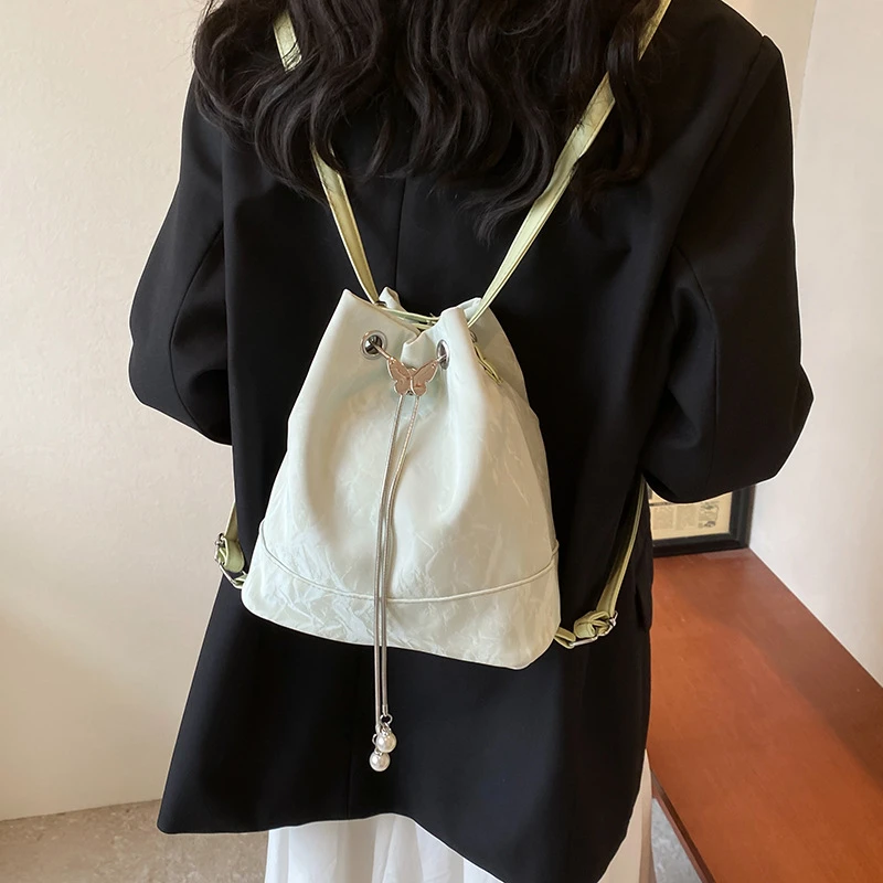 薄荷曼波绿双肩包包女式2024新款潮韩式水桶包百搭ins单肩腋下包