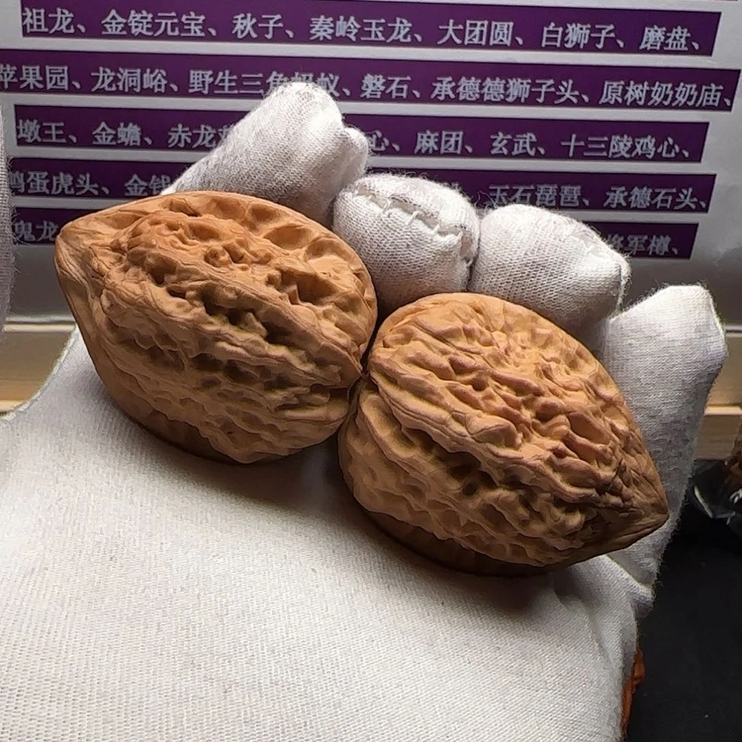 鱼***儿把件文玩核桃纳兰鸡心