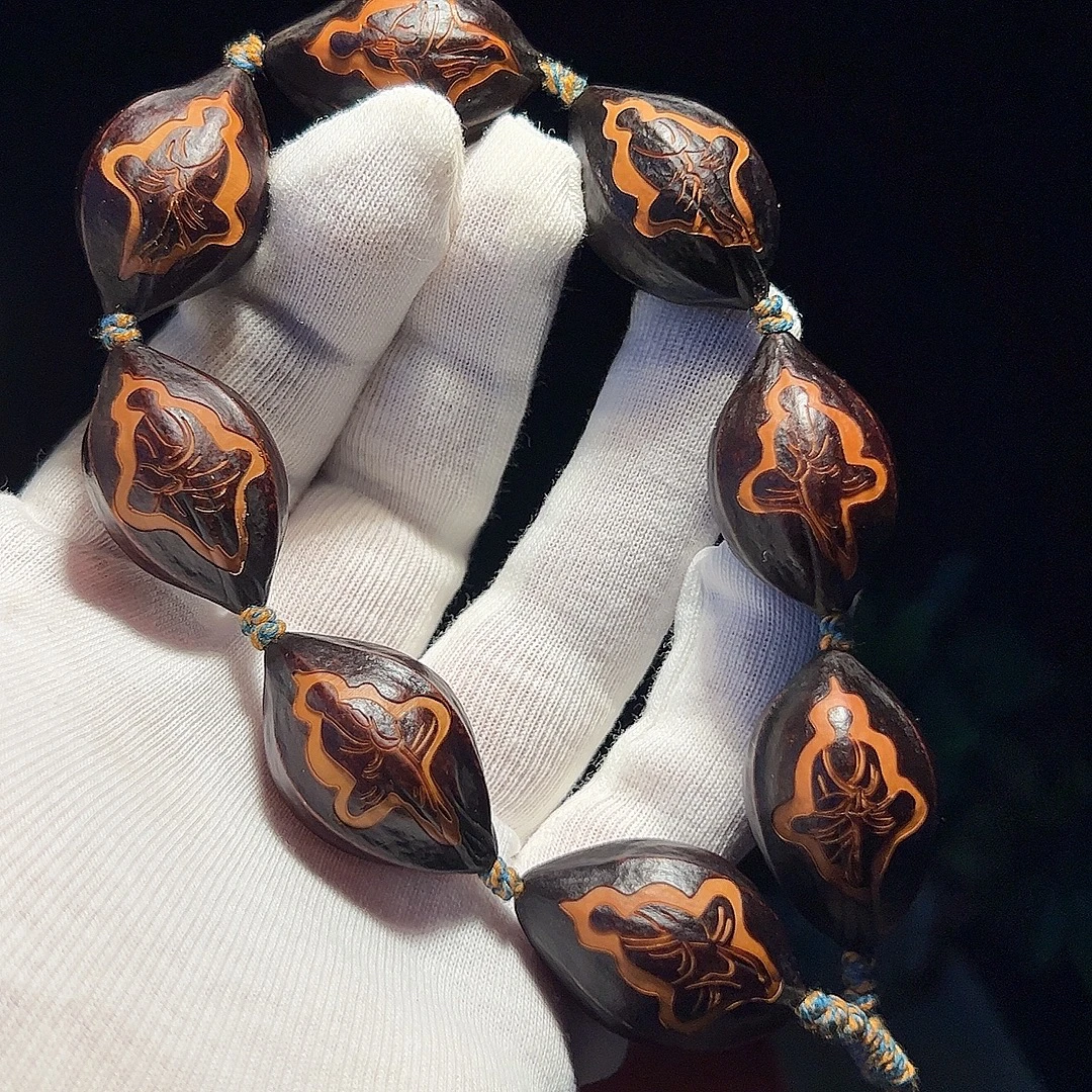 【真正的紫皮-无相佛】苏工纯手工橄榄核雕紫皮红肉无相佛文玩手持