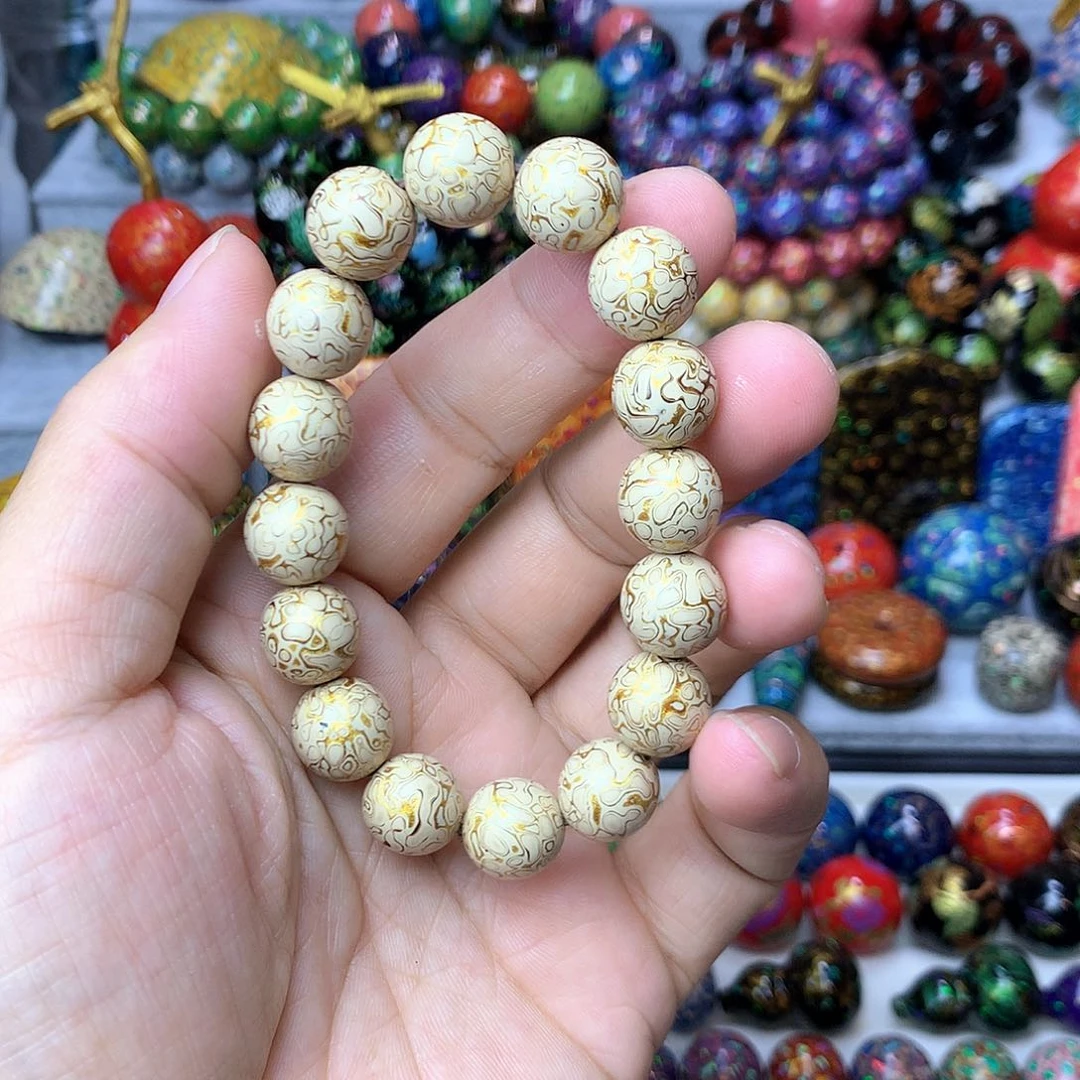 云*澜大漆犀皮1.2*16颗白金手串