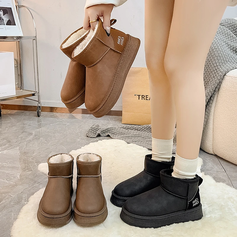 东北雪地靴女皮毛一体防滑靴子女加绒加厚短靴厚底一脚蹬雪地棉鞋