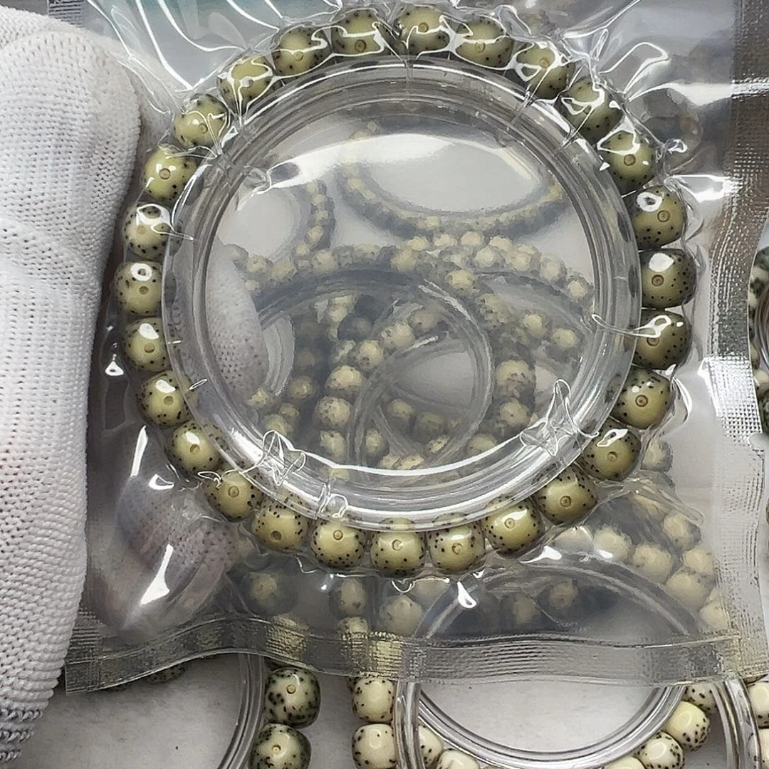 手串星月菩提8.5×7黄金瞳  864