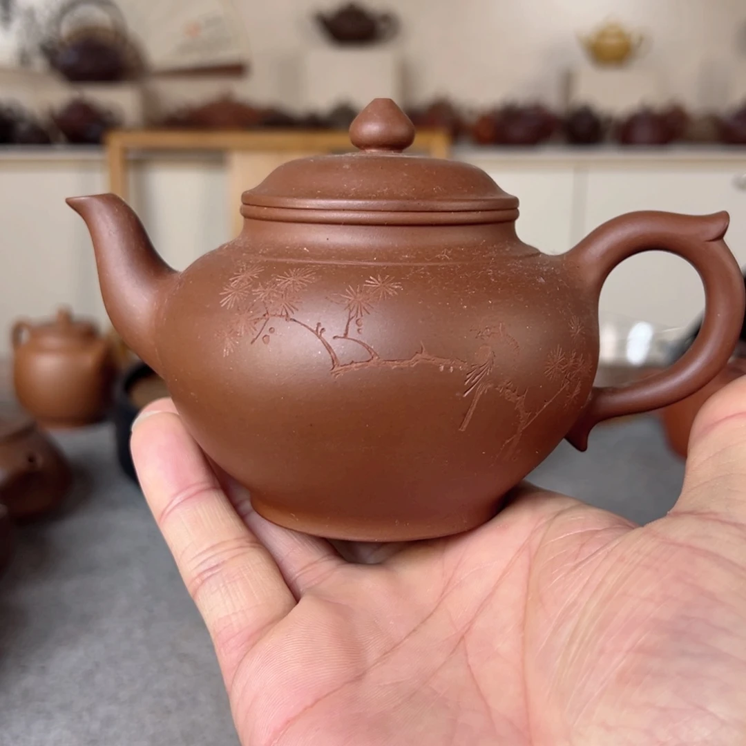 紫砂茶壶传***柜清水泥笑樱