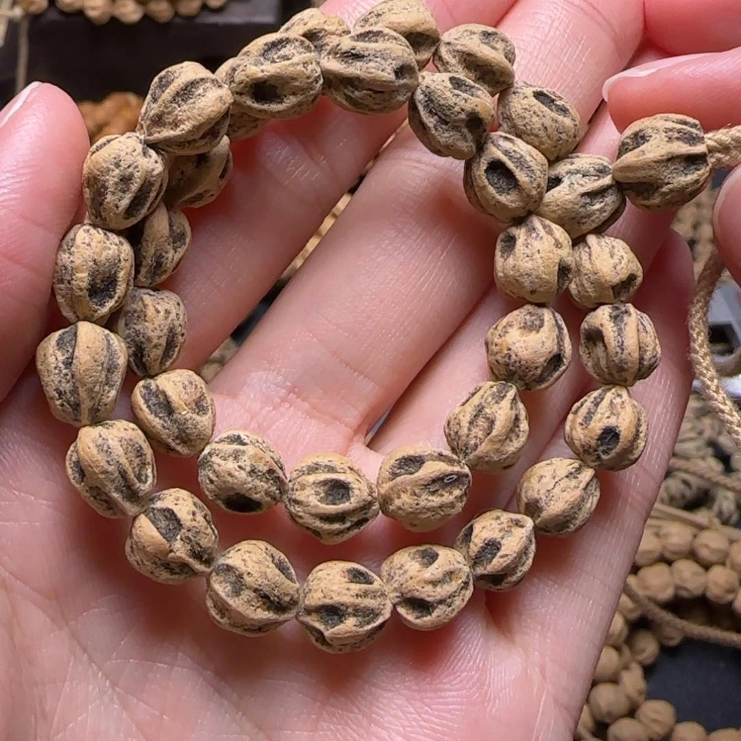 娜***娜柏香籽/百香籽吊坠