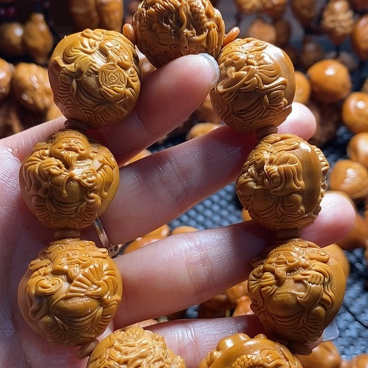 吊坠橄榄核风***翼龙财神