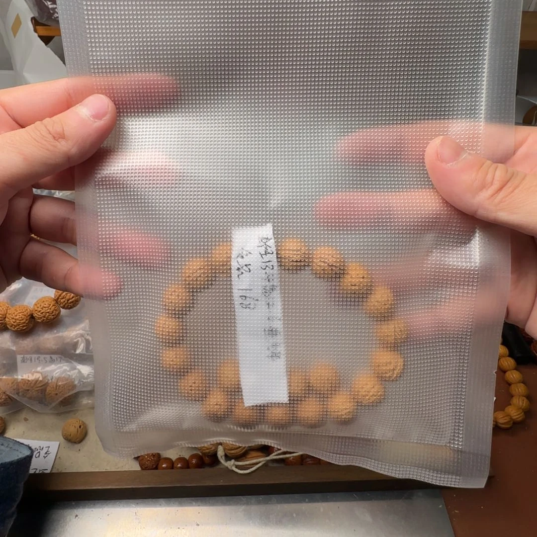 今***曲桃核吊坠盘锦野生核