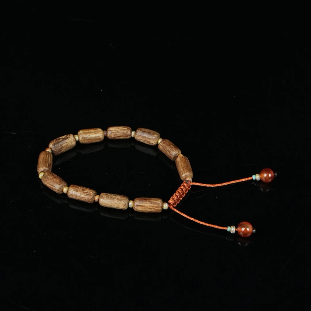 4040巴布亚沉香高山老料花香规整桶珠2.74g