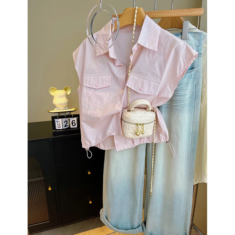 粉色洋气时尚抽绳皱设计感双口袋装饰单排扣无袖短款衬衫女上衣潮