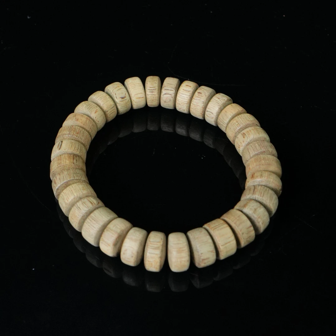 5817 马泥涝沉香高山老料奶香味平安扣手串 1.1x0.6cm   7.21g