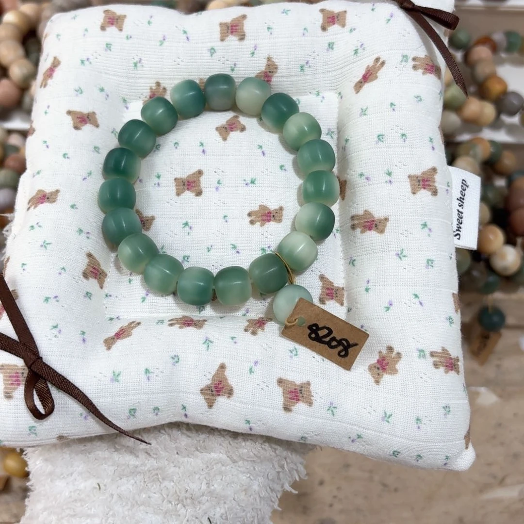 菩提根/象牙果吊坠8208卡11桶珠