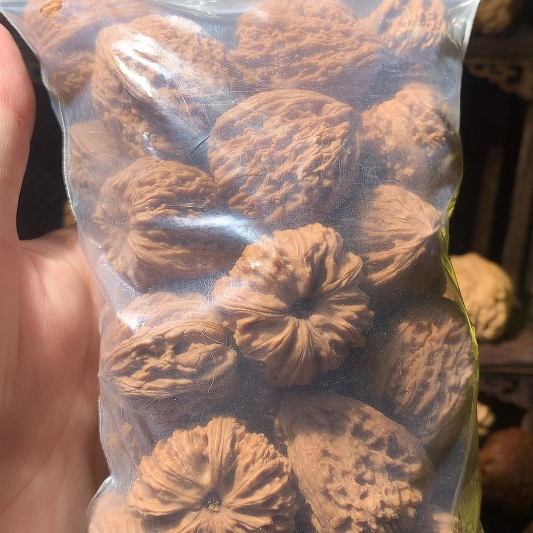 ****静吊坠文玩核桃一兜南疆石异形