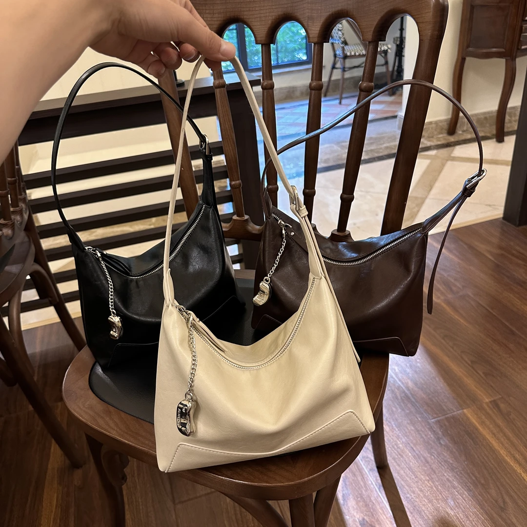 2025新款时尚百搭气质通勤大容量单肩斜挎慵懒饺子包女包  25062