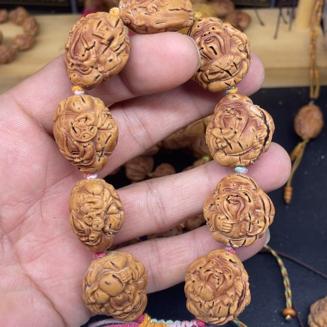 桃核雕刻寿星手串