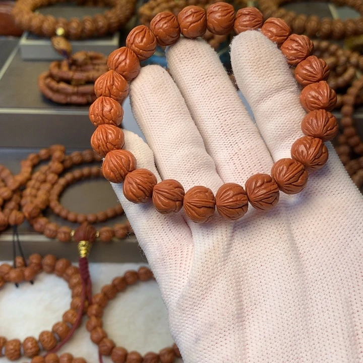 微***良桃核手串秦岭龙纹