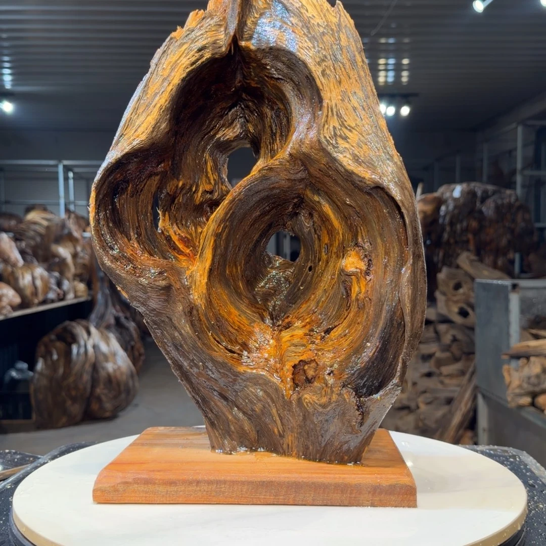 靳***起木王一刀琥珀木摆件91