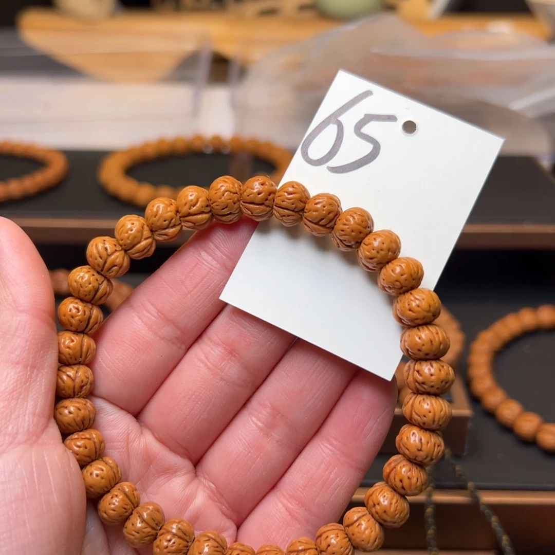 九***人文玩核桃把件秦岭龙纹桃核10蟠桃手持