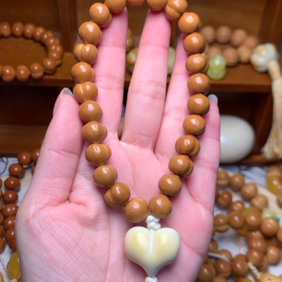 把件猴头核桃11屁桃手持爱心