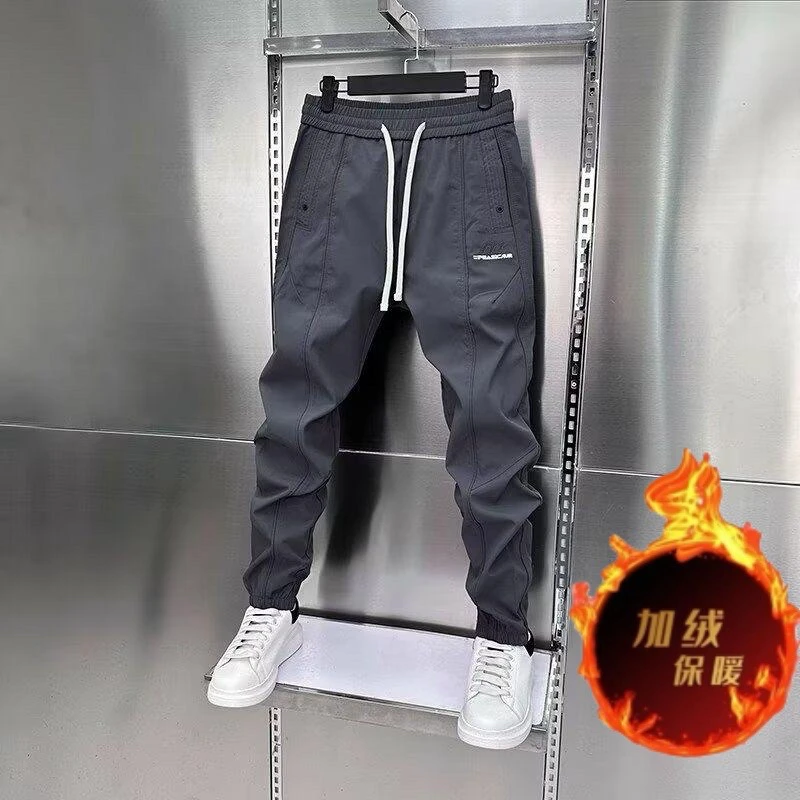 秋冬季新款男士拼接束脚休闲裤弹力松紧腰修身小脚裤刺绣纯色百搭