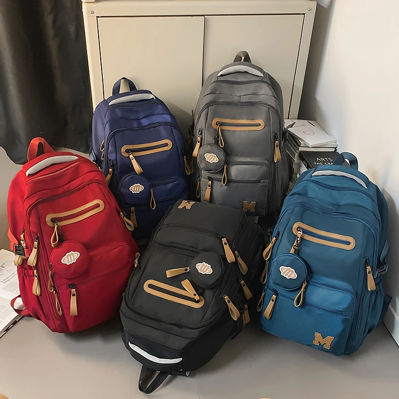 百搭大学生初高中书包减压护脊双肩背包大容量外出旅行双肩包休闲