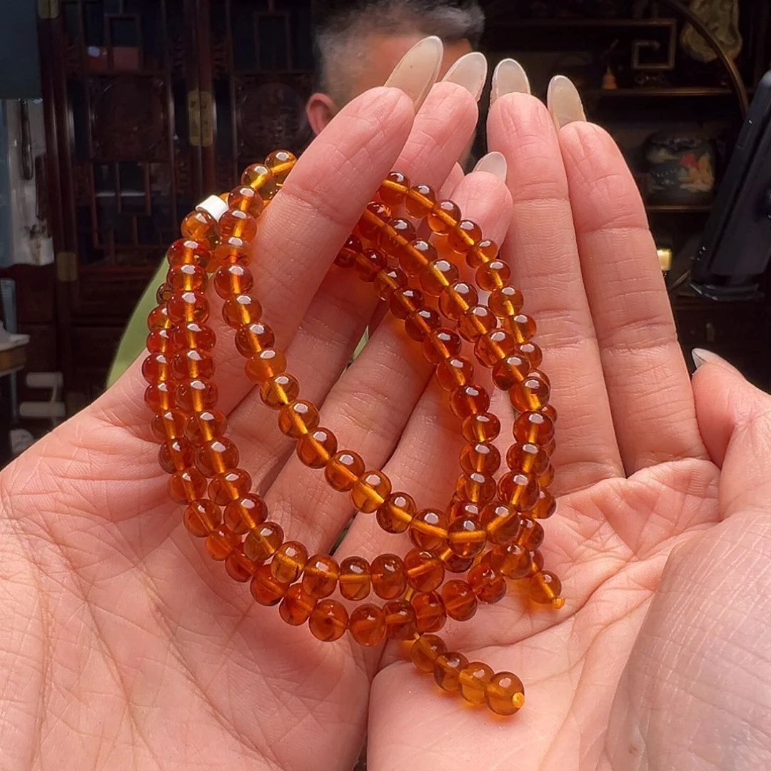 琥珀裸石未镶嵌梨*抚顺琥珀20450。6mm