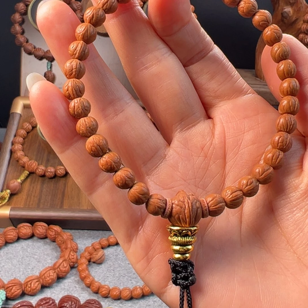 奔***客桃核吊坠0.7精卡单圈