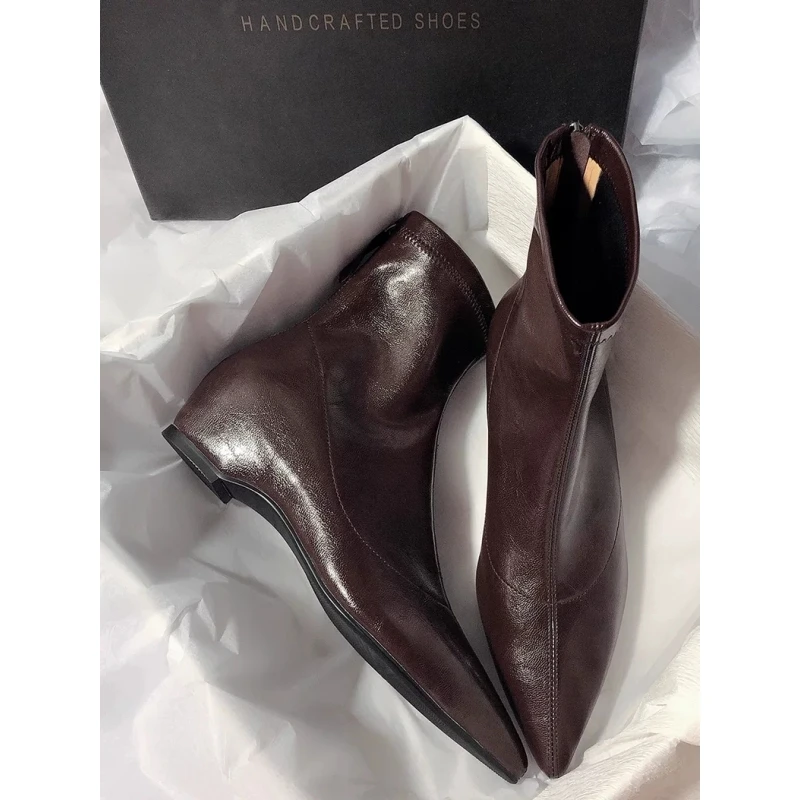 秋冬季新款短筒尖头真皮瘦瘦靴低跟后拉链百搭内增高通勤时装靴女