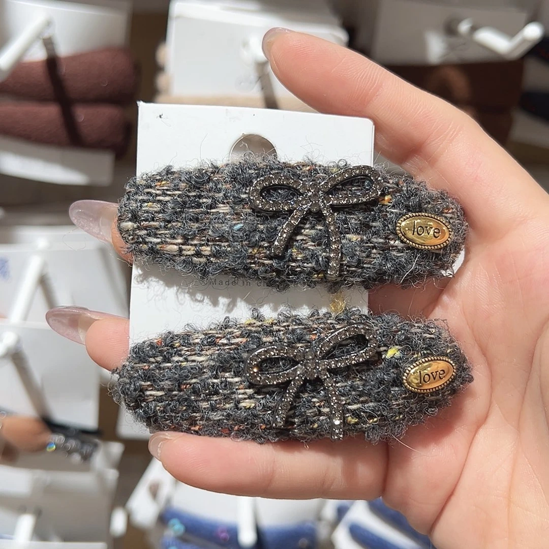 皮质铁合金蝴蝶结椭圆掰掰夹