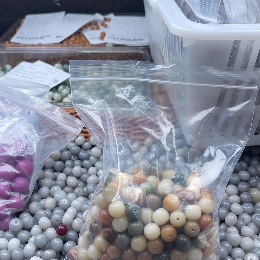 白玉菩提吊坠哎***?a微瑕锅底12mm/150颗