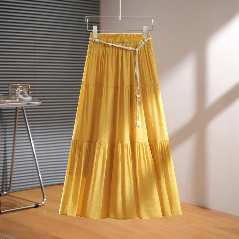 拉夏贝尔黄色绝美半身裙女夏季2025年新款显瘦A字垂感蛋糕裙长裙