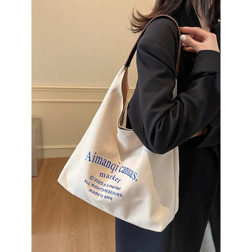 韩版文艺慵懒字母单肩帆布腋下包2025新款休闲时尚百搭学生托特包