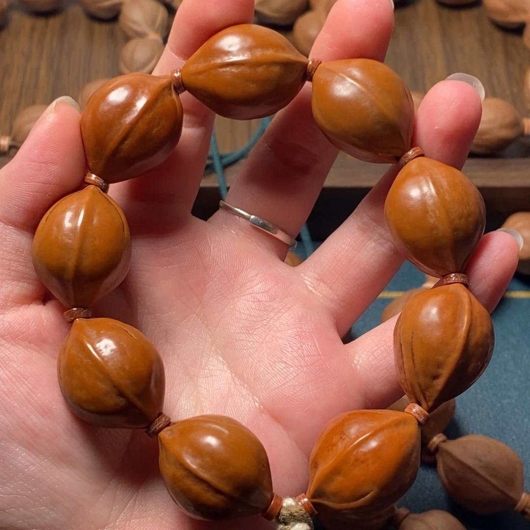 吴***卿橄榄核手串/手链2027梅林铁三花橄榄核