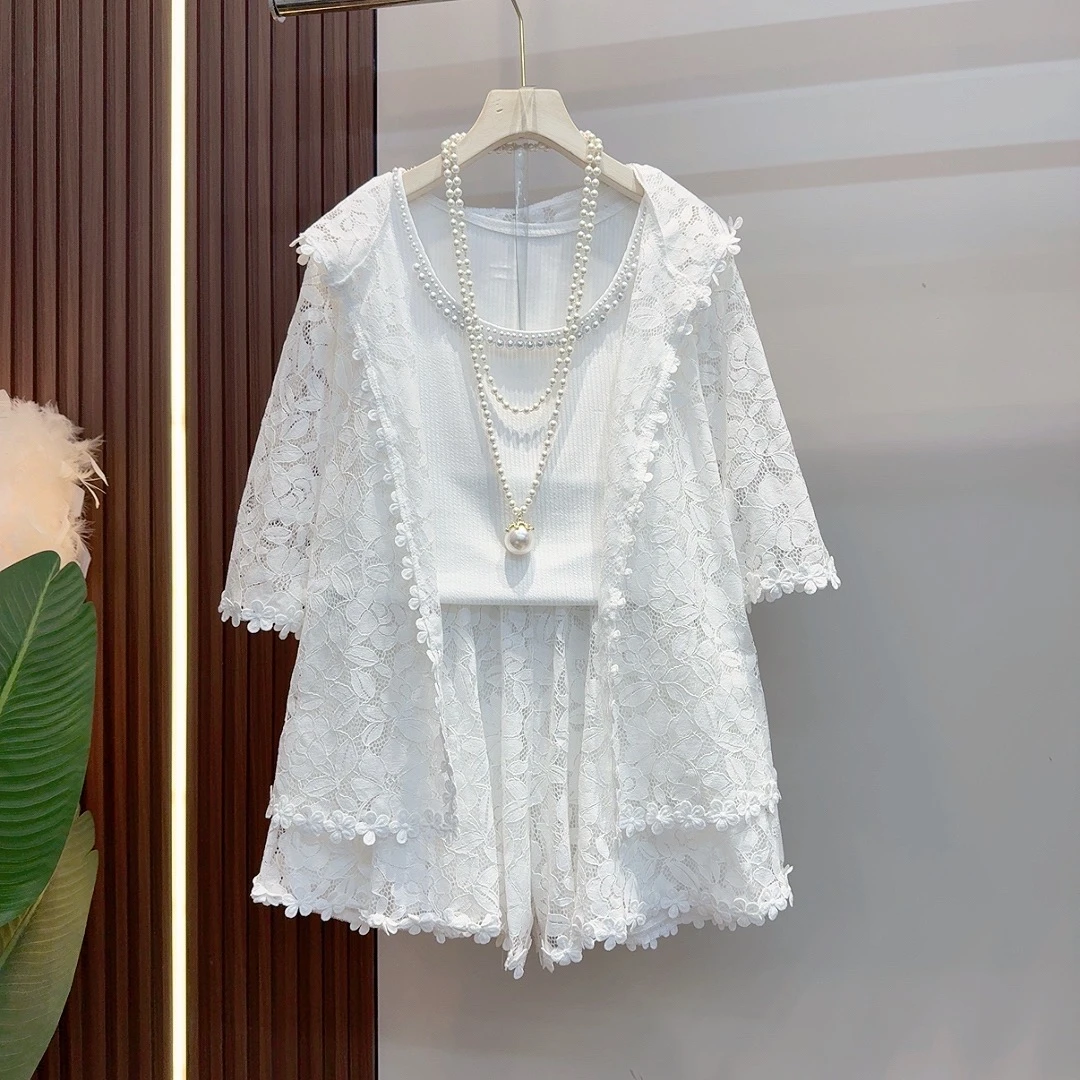 2025夏季新款气质蕾丝显瘦镂空花朵宽松时尚上衣短裤套装