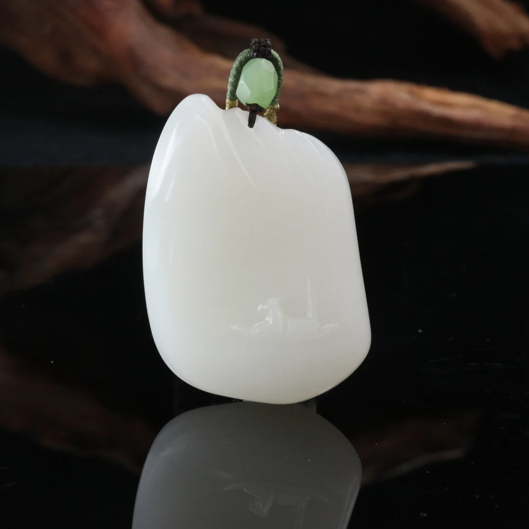 18和田玉羊脂白独钓寒江雪吊坠/500900上海嘉禾拍卖