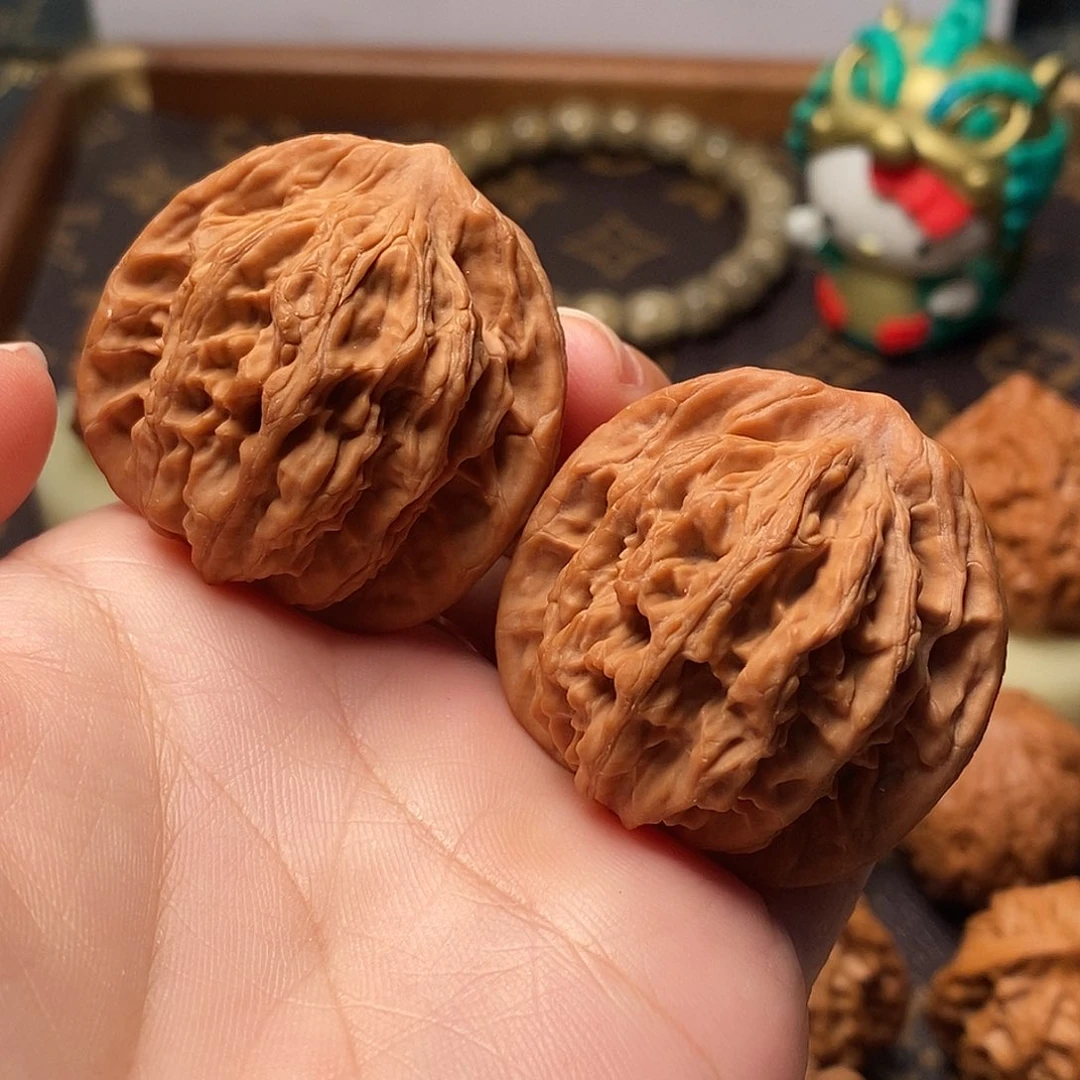桃核把件麦虎38尺。